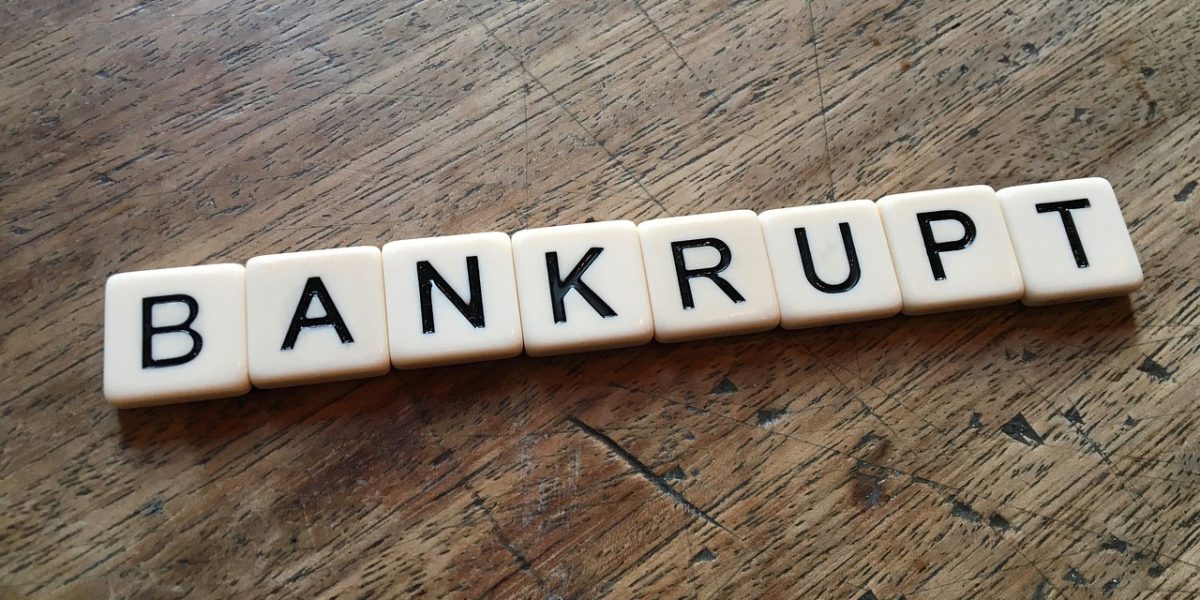 Tiles spelling out bankrupt - Small business bankruptcy lawyers at Finkel Law Group